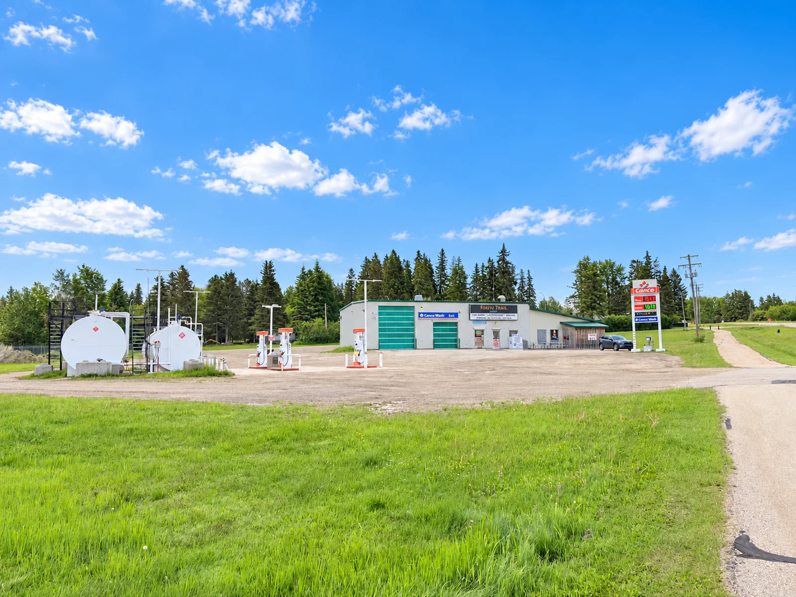 Foley Trail fuel station and car wash beneath a bright blue sky